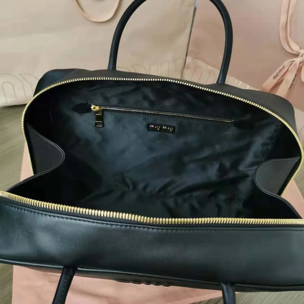 Miu Miu Leather Top-Handle Bag for Women in Black Miu Miu Leather Top-Handle Bag for Women in Black