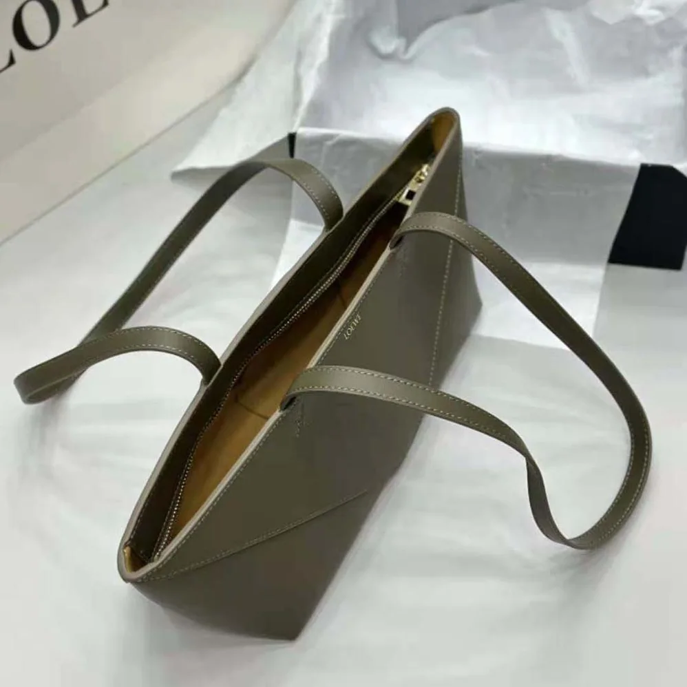 Loewe Cropped Puzzle Fold Bag in Shiny Calfskin for Women in Green Loewe Cropped Puzzle Fold Bag in Shiny Calfskin for Women in Green