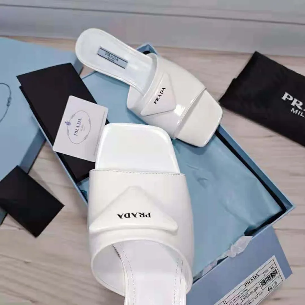 Prada Brushed Leather Mid-heeled Slides in 65mm Heel for Women in White Prada Brushed Leather Mid-heeled Slides in 65mm Heel for Women in White