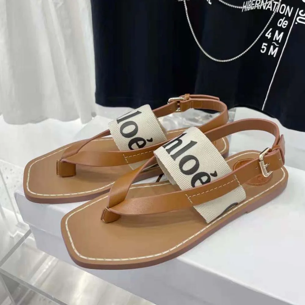 Chloe Woody Flat Sandal in Calfskin and Canvas for Women in White Chloe Woody Flat Sandal in Calfskin and Canvas for Women in White