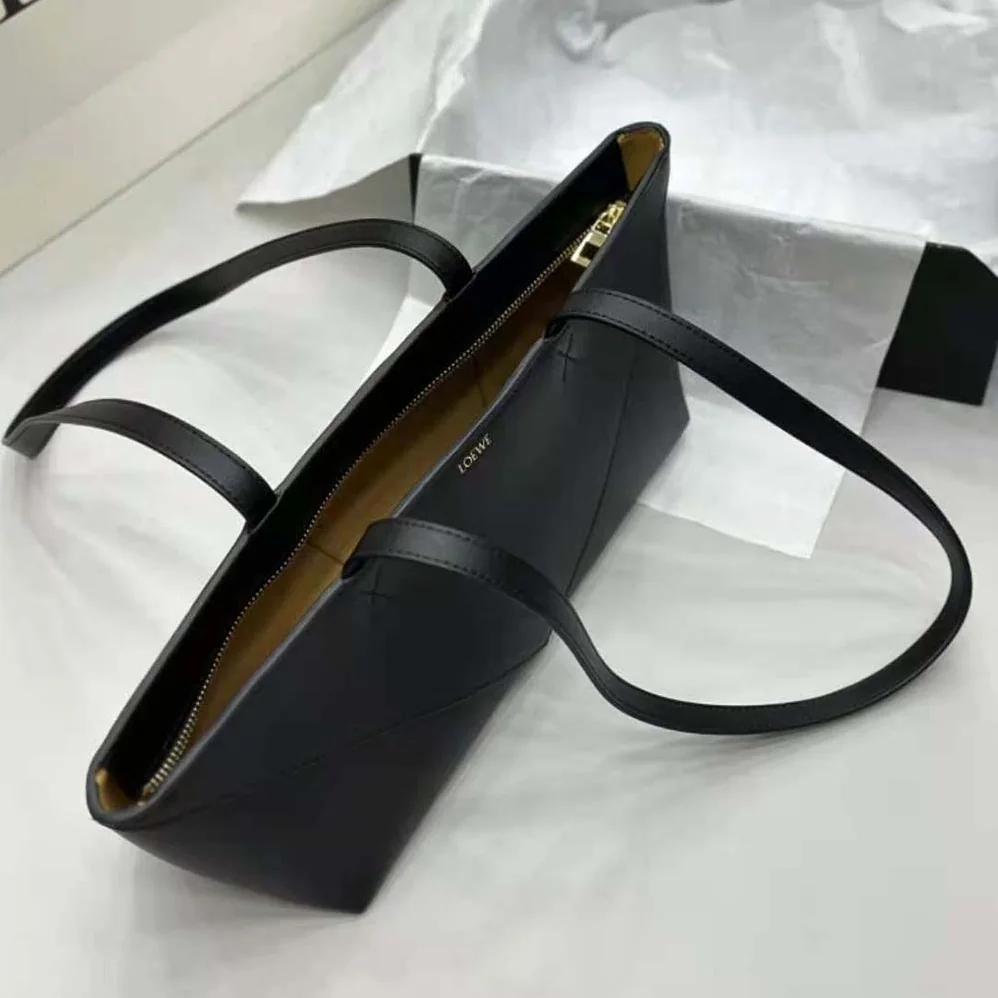Loewe Cropped Puzzle Fold Bag in Shiny Calfskin for Women in Black Loewe Cropped Puzzle Fold Bag in Shiny Calfskin for Women in Black