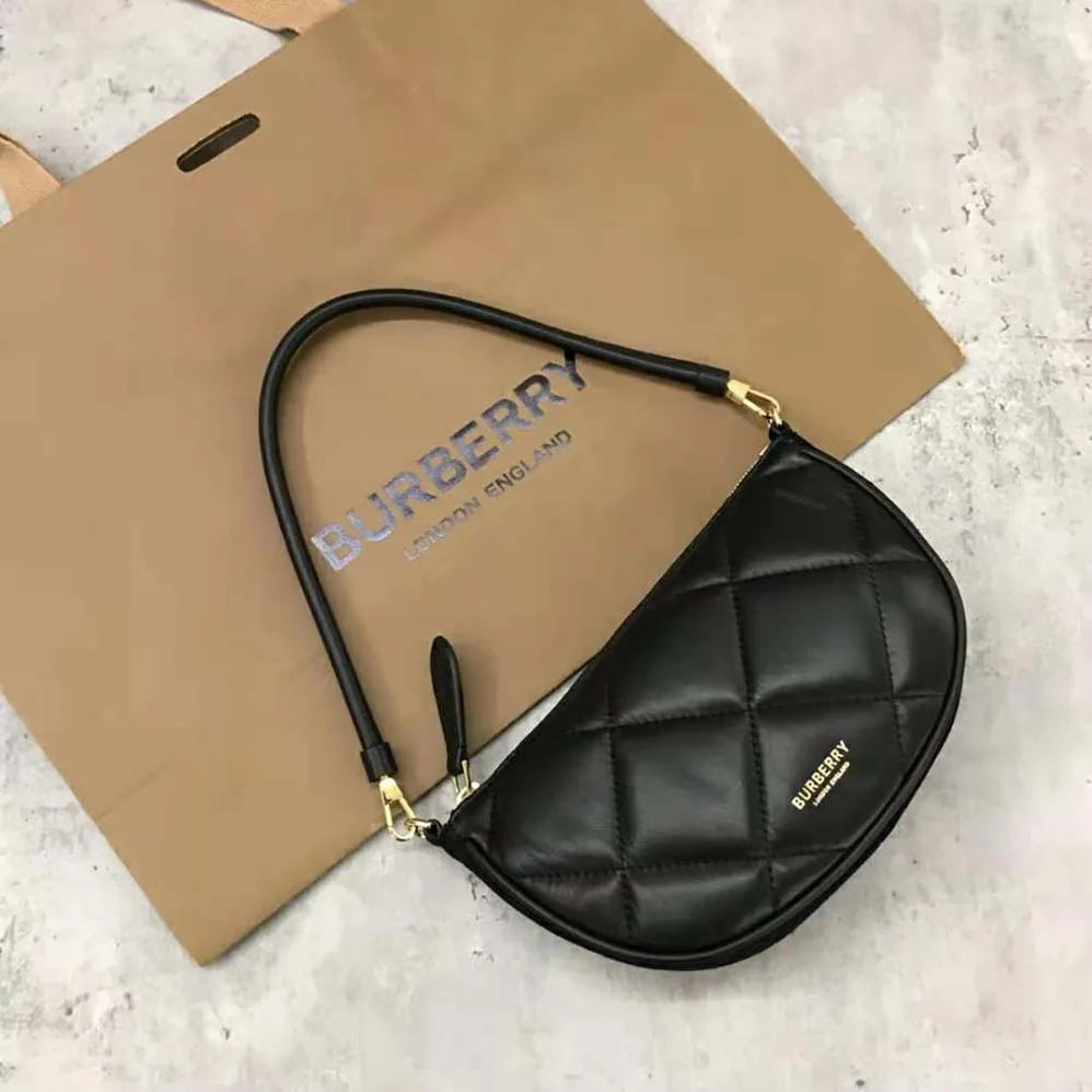 Burberry Quilted Lambskin Olympia Pouch for Women in Black Burberry Quilted Lambskin Olympia Pouch for Women in Black