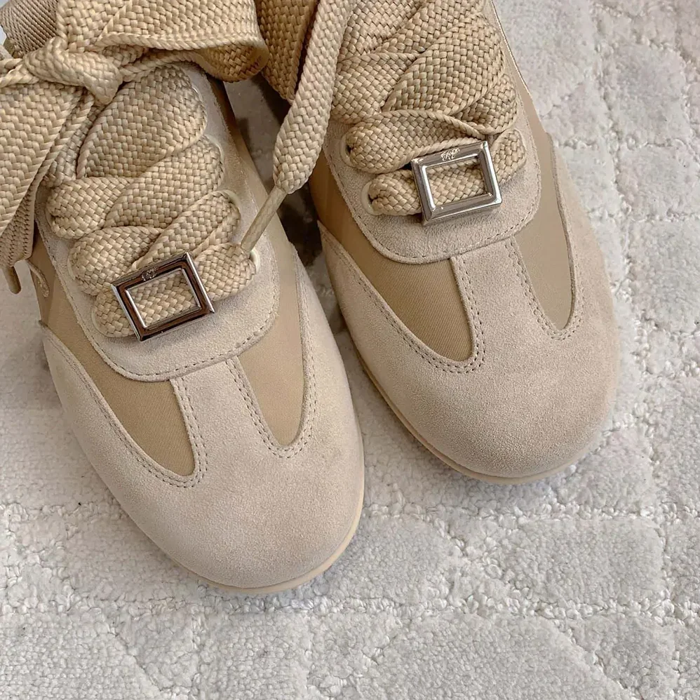 Roger Vivier Viv Low Sneakers in Suede for Women in Beige