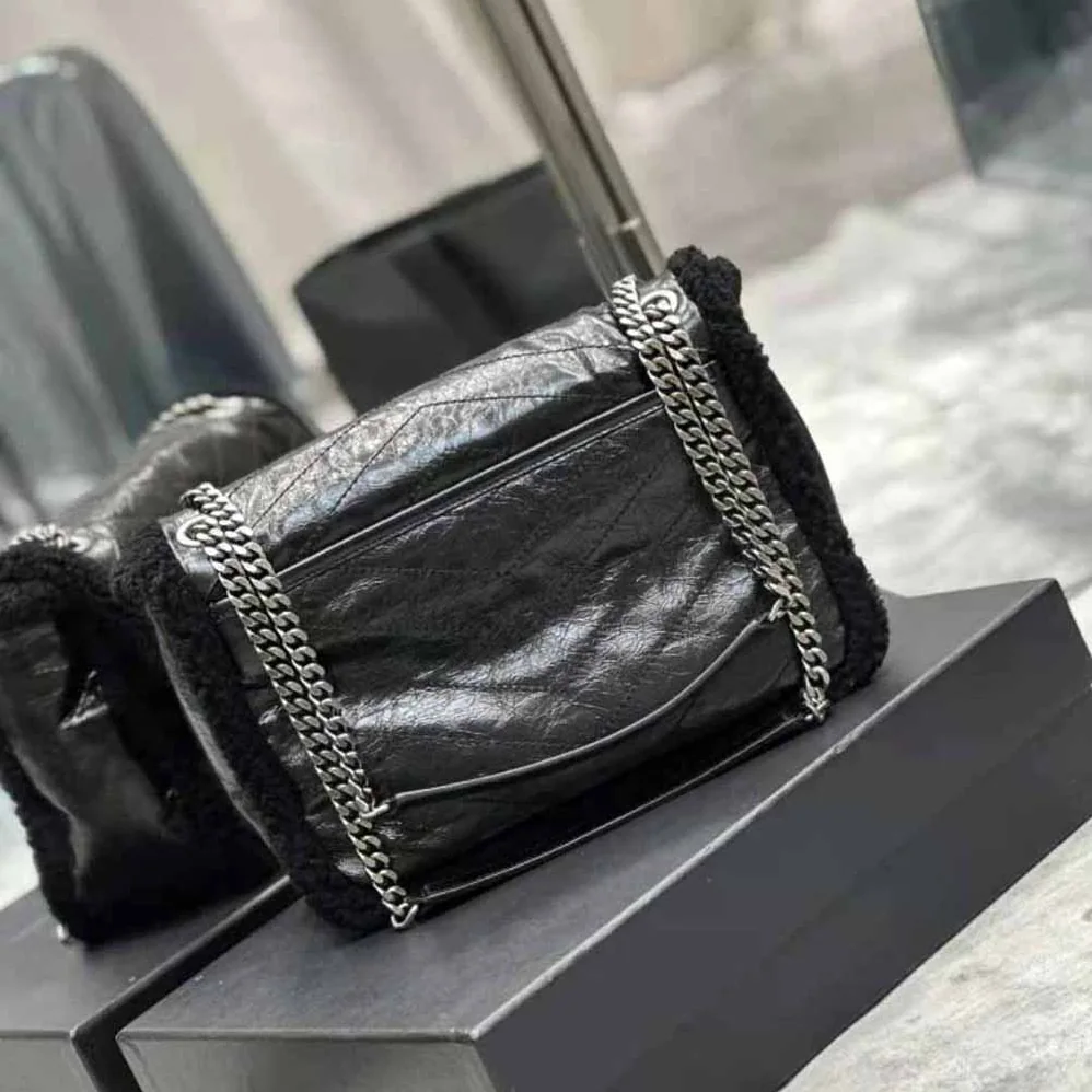 Saint Laurent YSL Niki Medium Chain Bag in Crinkled Leather and Shearling for Women Saint Laurent YSL Niki Medium Chain Bag in Crinkled Leather and Shearling for Women
