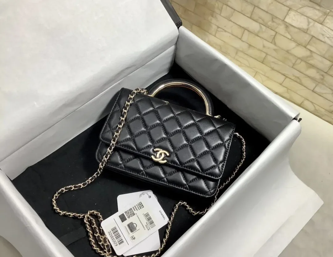 Chanel Hand-Held Oblique Cross Bag Black