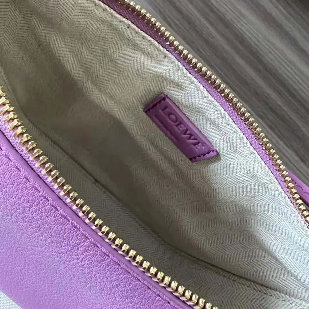 Loewe Mini Hammock Hobo Bag in Classic Calfskin for Women in Rose Loewe Mini Hammock Hobo Bag in Classic Calfskin for Women in Rose