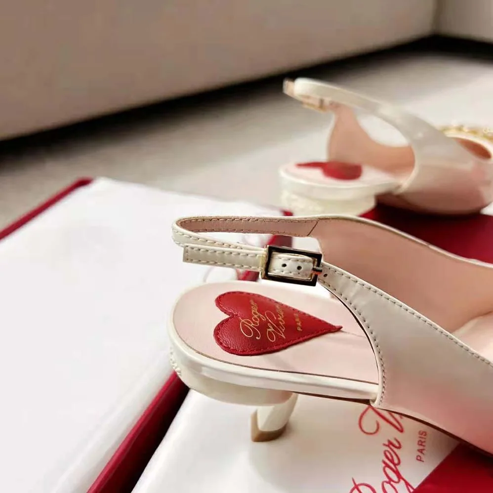 Roger Vivier Virgule Strass Buckle Slingback Pumps in Patent Leather for Women in White Roger Vivier Virgule Strass Buckle Slingback Pumps in Patent Leather for Women in White