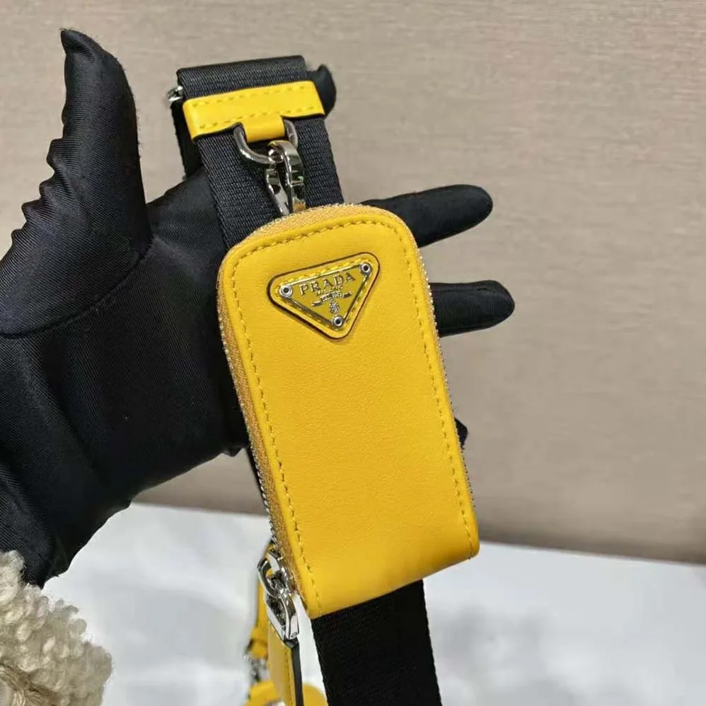 Prada Leather Triangle Shoulder Bag for Women in Yellow Prada Leather Triangle Shoulder Bag for Women in Yellow