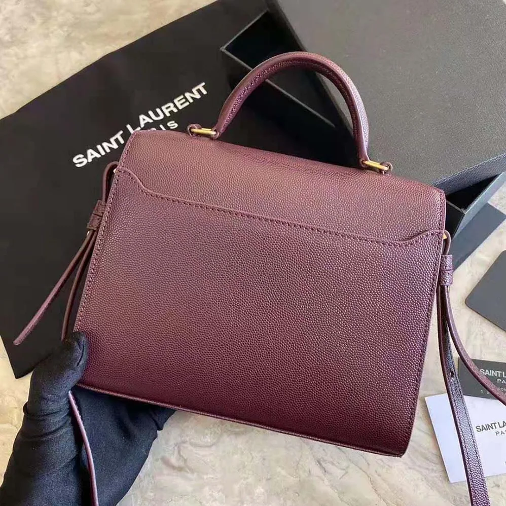 Saint Laurent YSL Cassandra Top Handle Medium Bag in Grain DE Poudre Embossed Leather for Women in Maroon