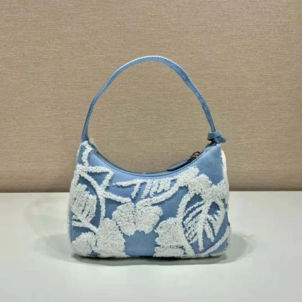 Prada Re-Edition 2000 Embroidered Drill Mini Bag for Women in Blue