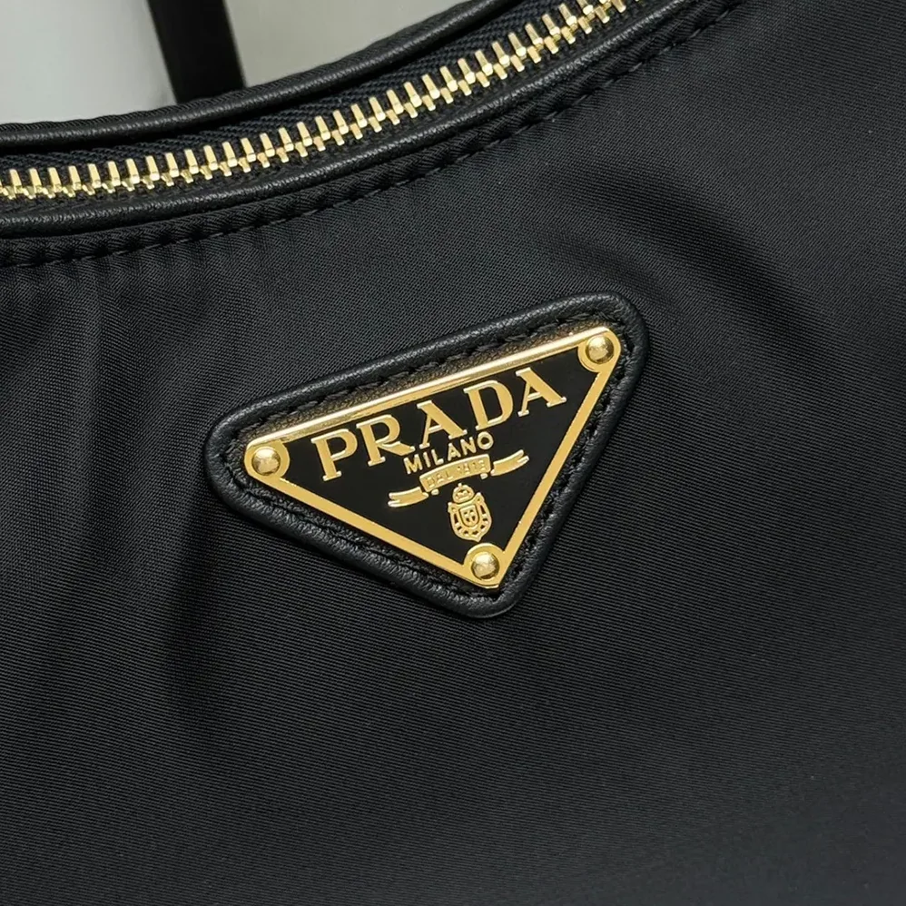 Prada Aimée large Re-Nylon and Leather Shoulder Bag with Padlock for Women Prada Aimée large Re-Nylon and Leather Shoulder Bag with Padlock for Women