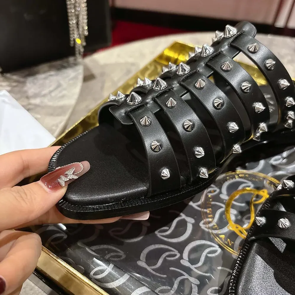 Christian Louboutin Charja Mules Waxed Calf Leather for Women in Black Christian Louboutin Charja Mules Waxed Calf Leather for Women in Black