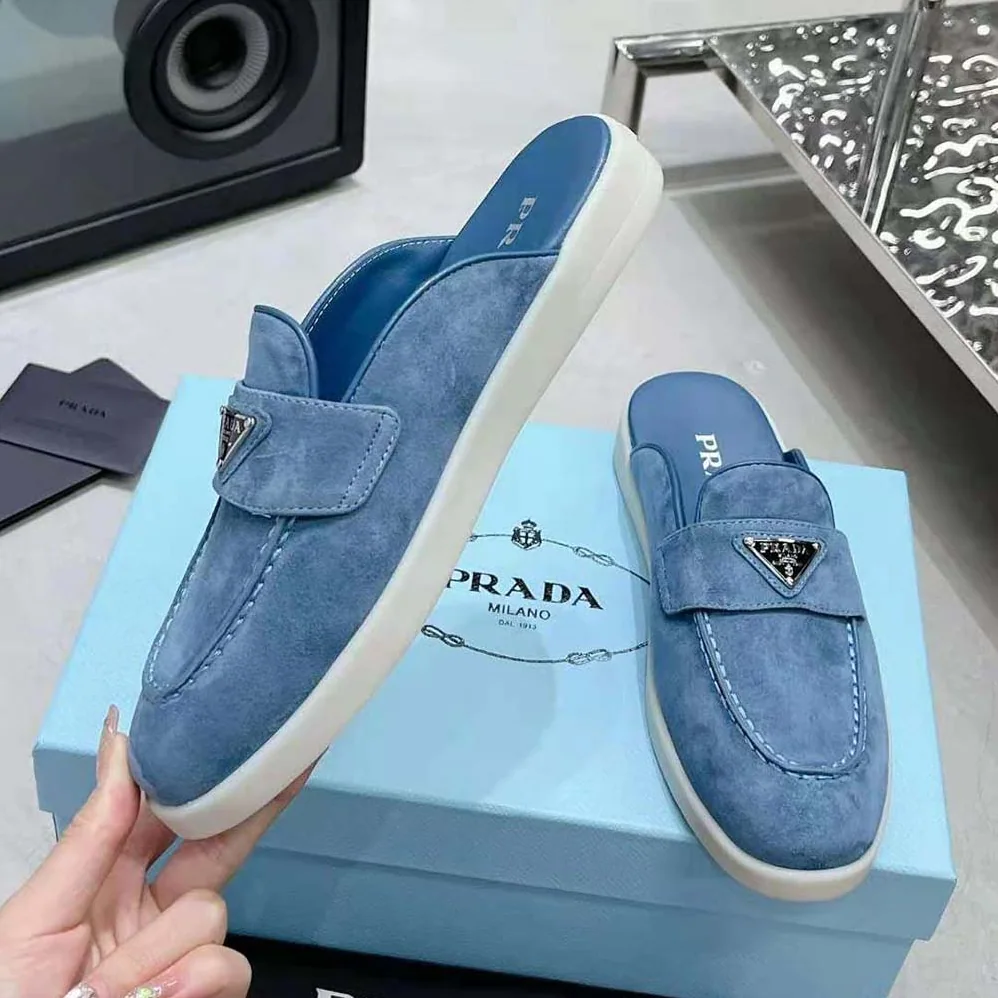 Prada Suede Sabots with the Enameled Metal Triangle Logo for Men