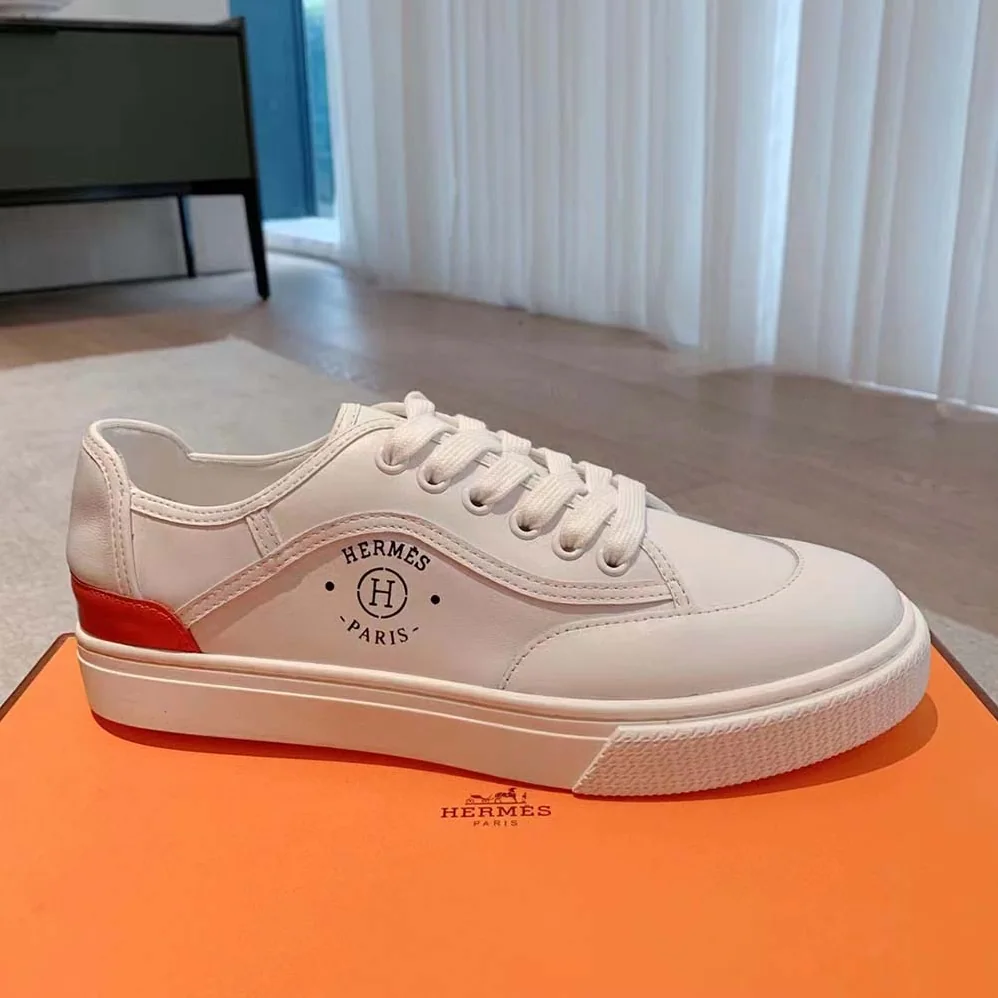 Hermes Get Sneaker in Calfskin with Signature “Hermès Paris” Stencil for Unisex in White Hermes Get Sneaker in Calfskin with Signature “Hermès Paris” Stencil for Unisex in White