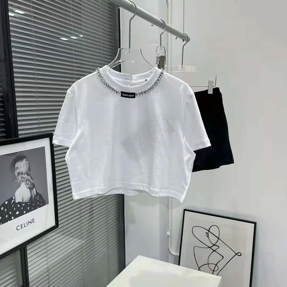 Miu Miu Embroidered Cotton T-shirt with Logo Patch for Women in White Miu Miu Embroidered Cotton T-shirt with Logo Patch for Women in White