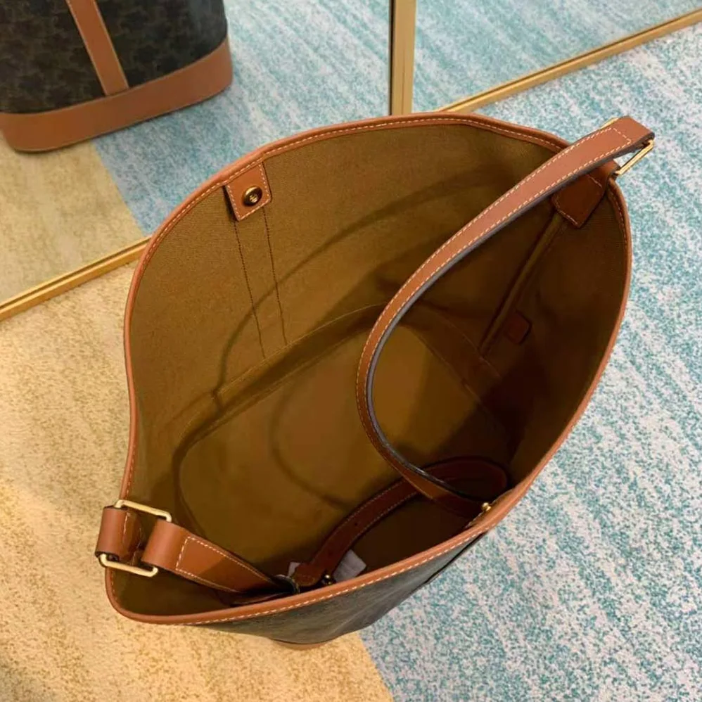 Celine Medium Bucket in Triomphe Canvas for Women in Brown Celine Medium Bucket in Triomphe Canvas for Women in Brown