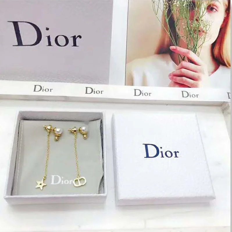 Dior La Petite Tribale Earrings in Gold for Women in Tone Metal Dior La Petite Tribale Earrings in Gold for Women in Tone Metal