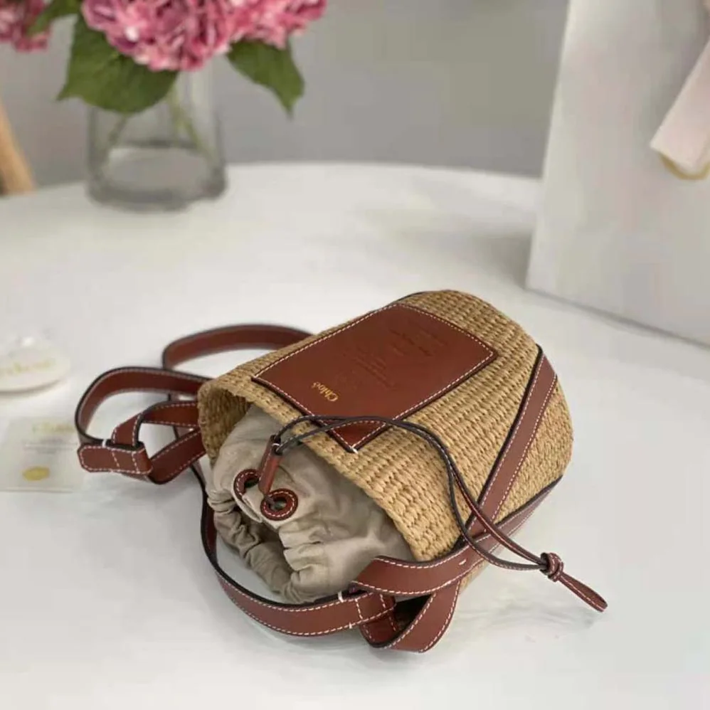 Chloe Small Basket in Fair-Trade Paper and Shiny Calfskin for Women in Brown Chloe Small Basket in Fair-Trade Paper and Shiny Calfskin for Women in Brown