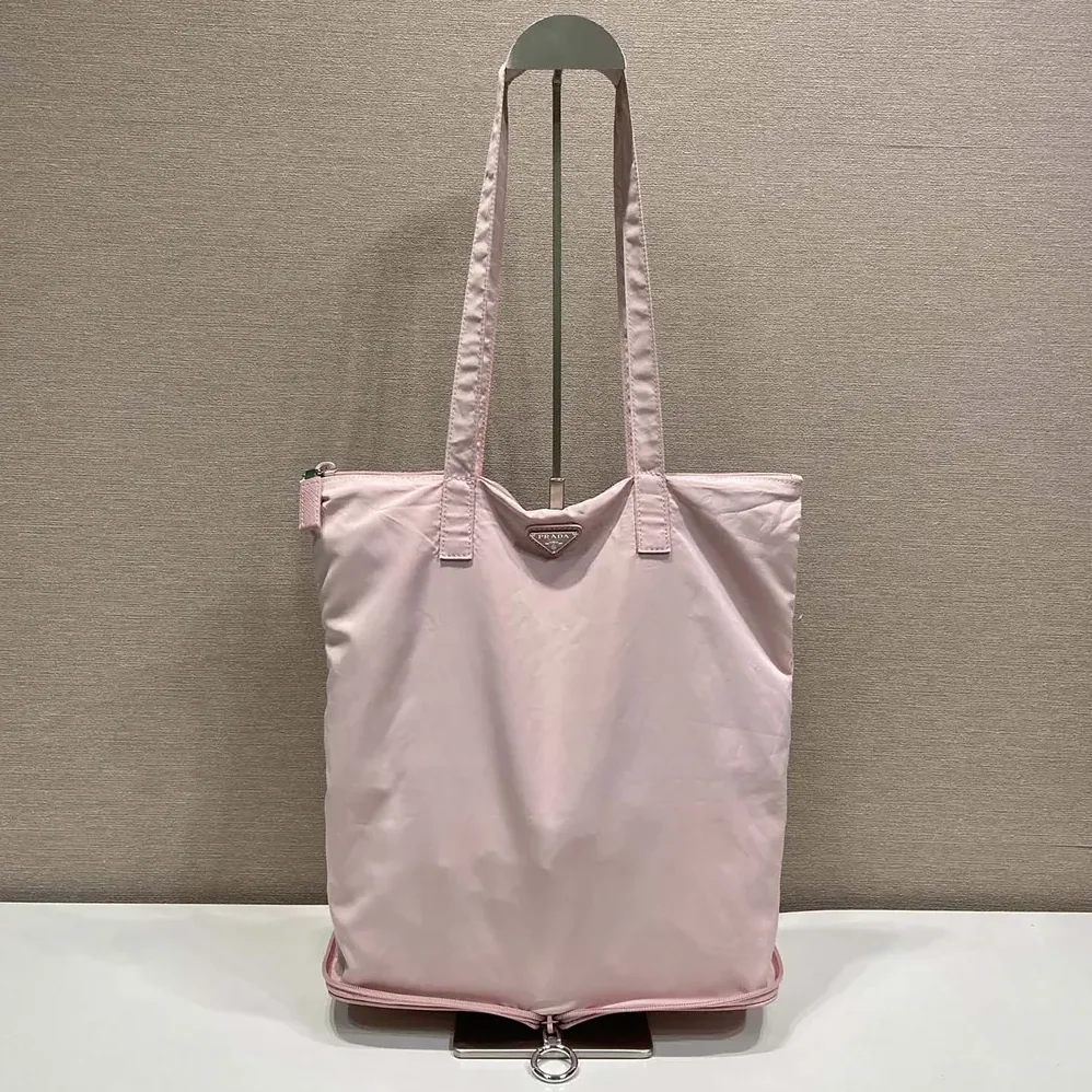 Prada Saffiano Leather Pendant With Re-Nylon Tote Bag for Women in Peach Prada Saffiano Leather Pendant With Re-Nylon Tote Bag for Women in Peach