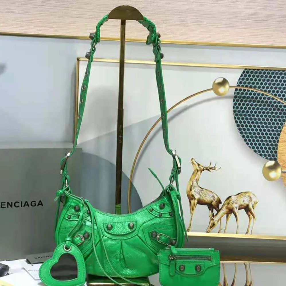 Balenciaga Le Cagole XS Shoulder Bag for Women in Green Balenciaga Le Cagole XS Shoulder Bag for Women in Green