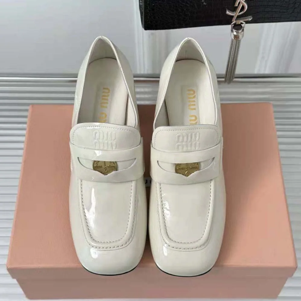 Miu Miu Patent Leather Loafers with Embossed Logo on the Tongue for Women in White Miu Miu Patent Leather Loafers with Embossed Logo on the Tongue for Women in White