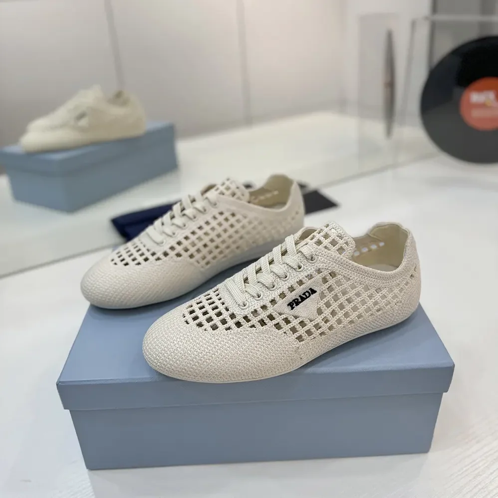 Prada Collapse Crochet Laced Sneakers for Unisex in White Prada Collapse Crochet Laced Sneakers for Unisex in White