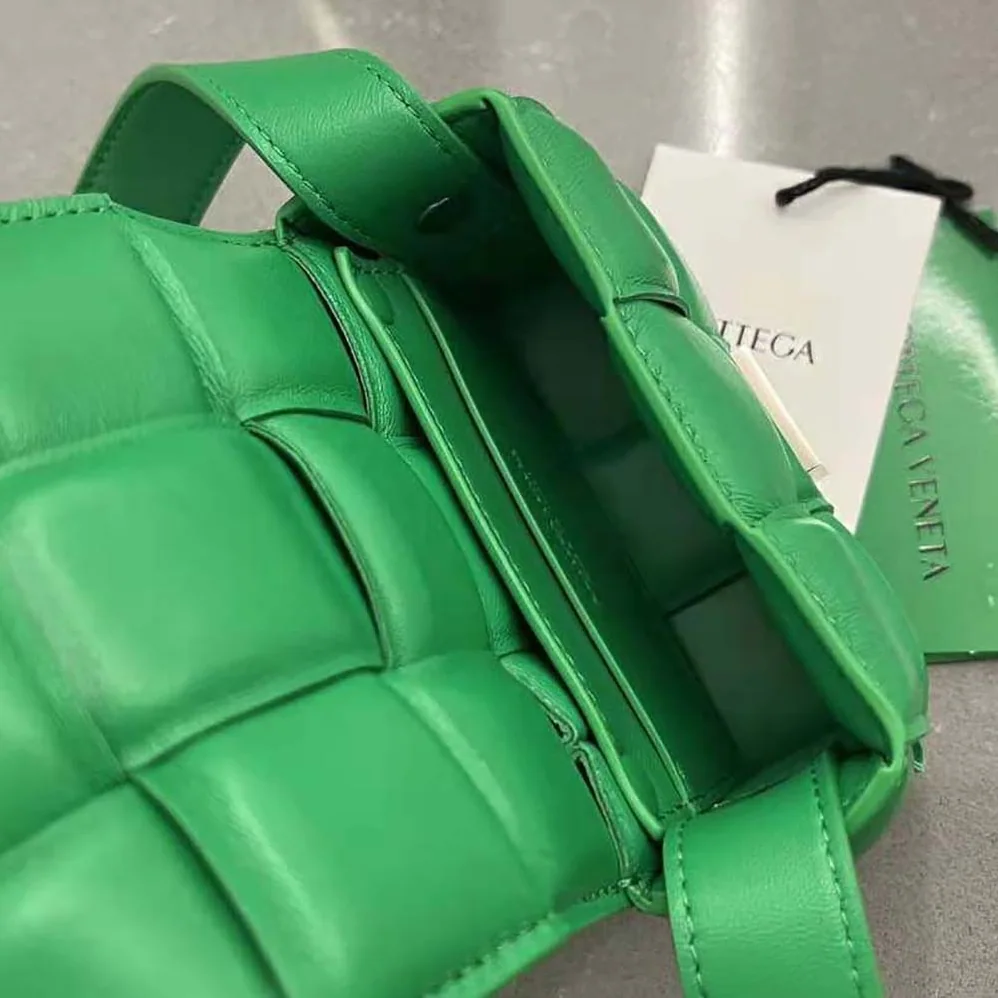 Bottega Veneta Candy Padded Cassette Mini Padded Intreccio Leather Cross-Body Bag for Women in Green Bottega Veneta Candy Padded Cassette Mini Padded Intreccio Leather Cross-Body Bag for Women in Green