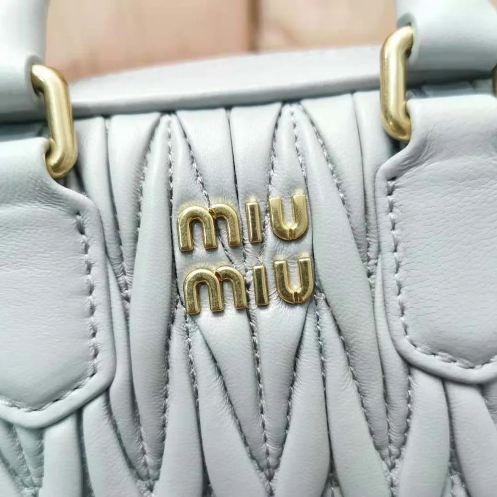 Miu Miu Matelassé Nappa Leather Top-Handle Mini-Bag for Women in Silver