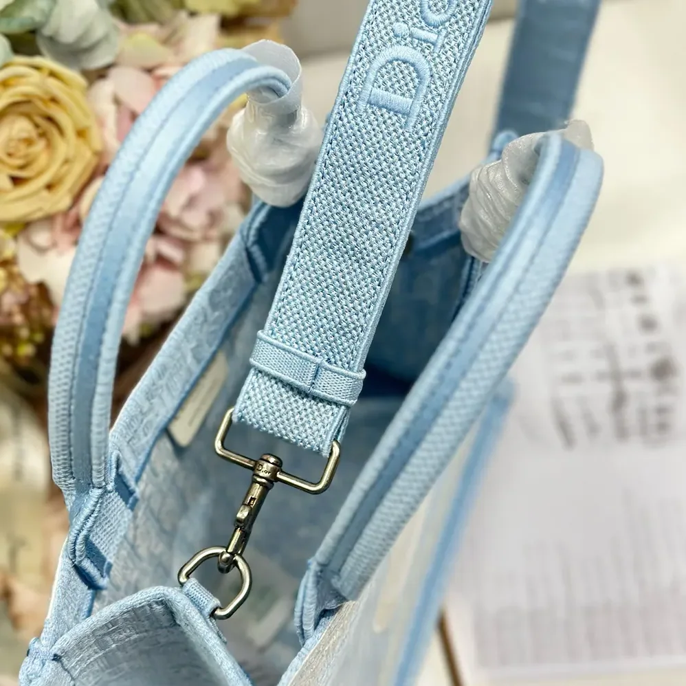 Dior Small Dior Book Tote with Strap Celestial Blue Dior Oblique Embroidery with White Lace and Dior Médaillon for Women Dior Small Dior Book Tote with Strap Celestial Blue Dior Oblique Embroidery with White Lace and Dior Médaillon for Women