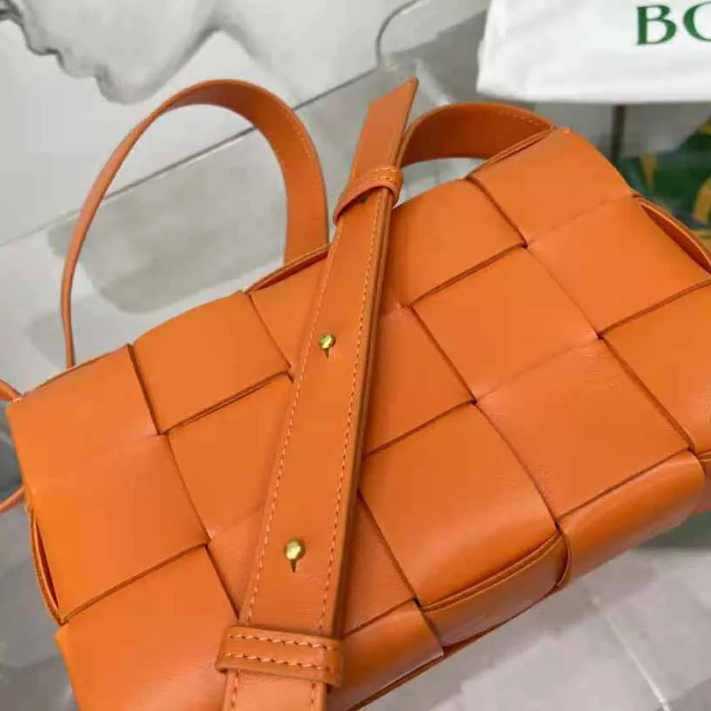 Bottega Veneta Cassette Intreccio Leather Cross-Body Bag for Women in Orange Bottega Veneta Cassette Intreccio Leather Cross-Body Bag for Women in Orange