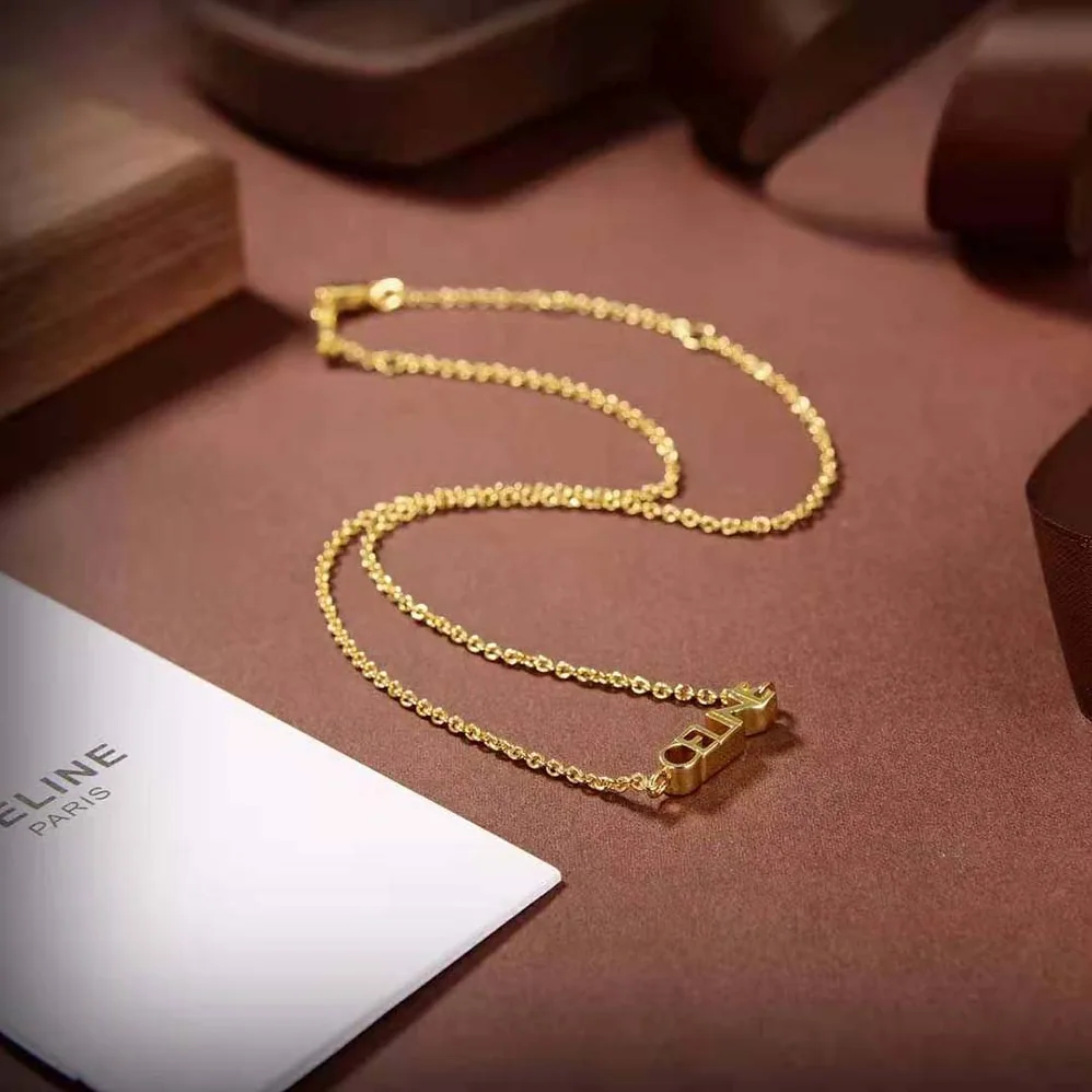 Celine Typo Necklace in Brass with Gold Finish for Women Celine Typo Necklace in Brass with Gold Finish for Women