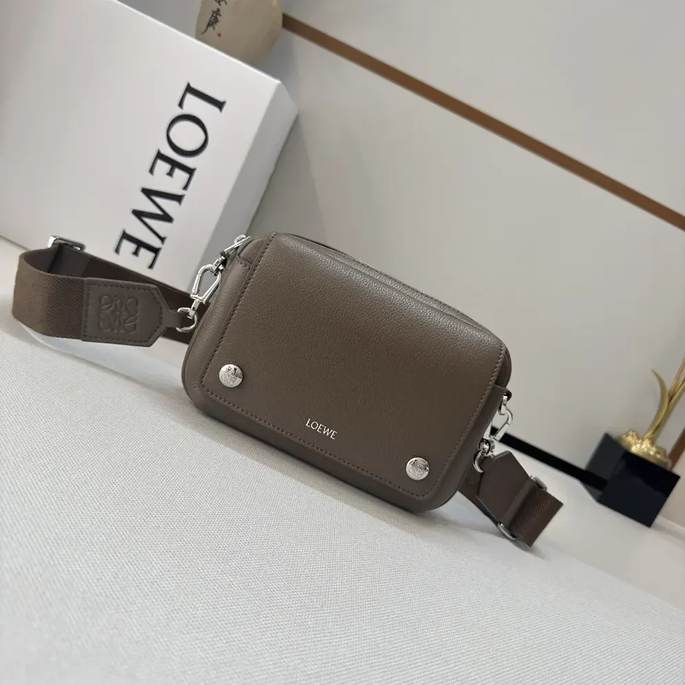 Loewe Small Pebble Messenger Bag in Supple Grained Calfskin for Unisex in Brown