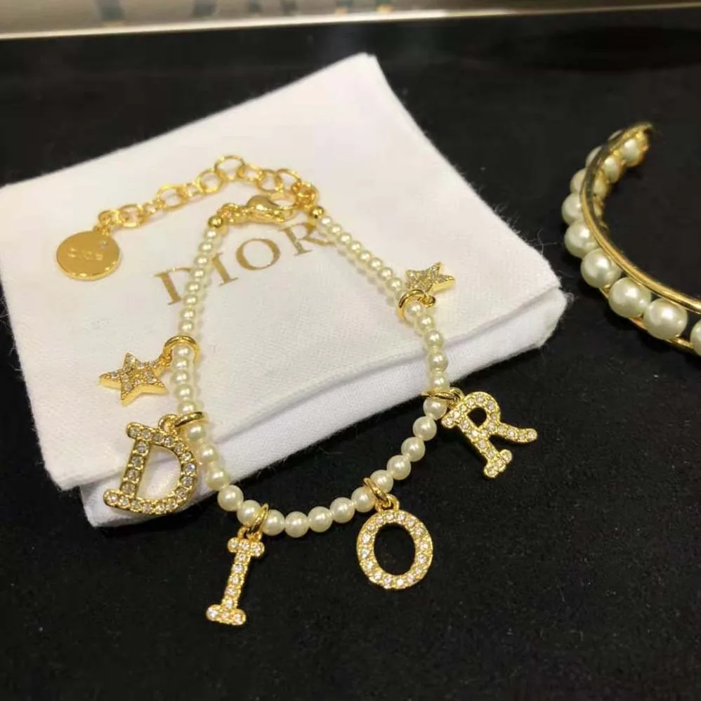 Dior Dio(r)evolution Bracelet Gold-Finish Metal White Resin Pearls and White Crystals for Women Dior Dio(r)evolution Bracelet Gold-Finish Metal White Resin Pearls and White Crystals for Women