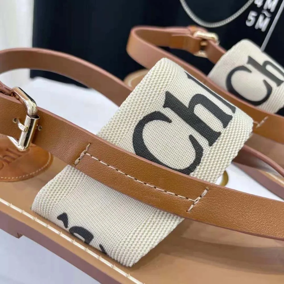Chloe Woody Flat Sandal in Calfskin and Canvas for Women in White Chloe Woody Flat Sandal in Calfskin and Canvas for Women in White