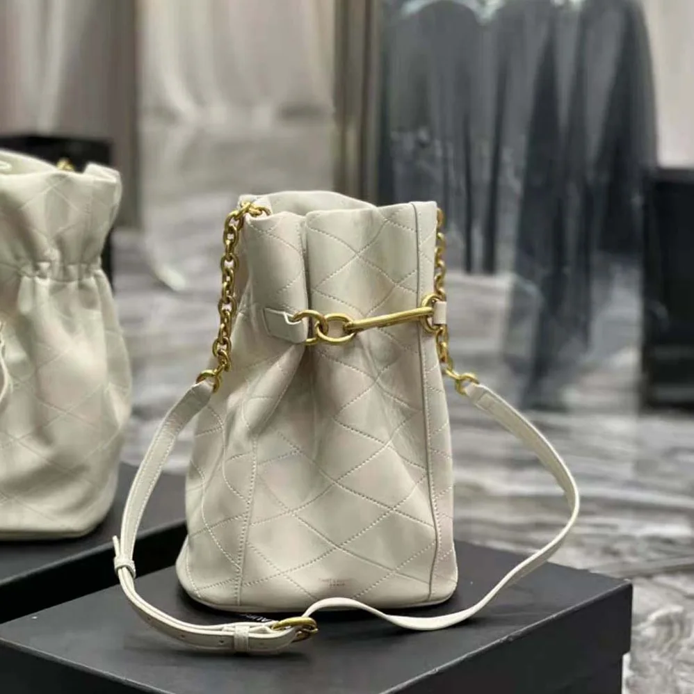 Saint Laurent YSL Le Maillon Hook Bucket Bag in Supple Leather for Women in White Saint Laurent YSL Le Maillon Hook Bucket Bag in Supple Leather for Women in White