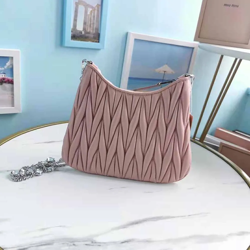 Miu Miu Small Matelasse Nappa Leather Shoulder Bag for Women in Pink Miu Miu Small Matelasse Nappa Leather Shoulder Bag for Women in Pink