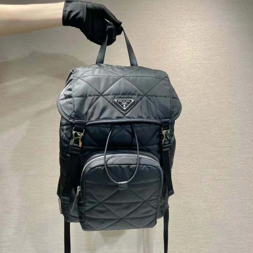 Prada Re-Nylon Backpack with Topstitching for Men in Black Prada Re-Nylon Backpack with Topstitching for Men in Black