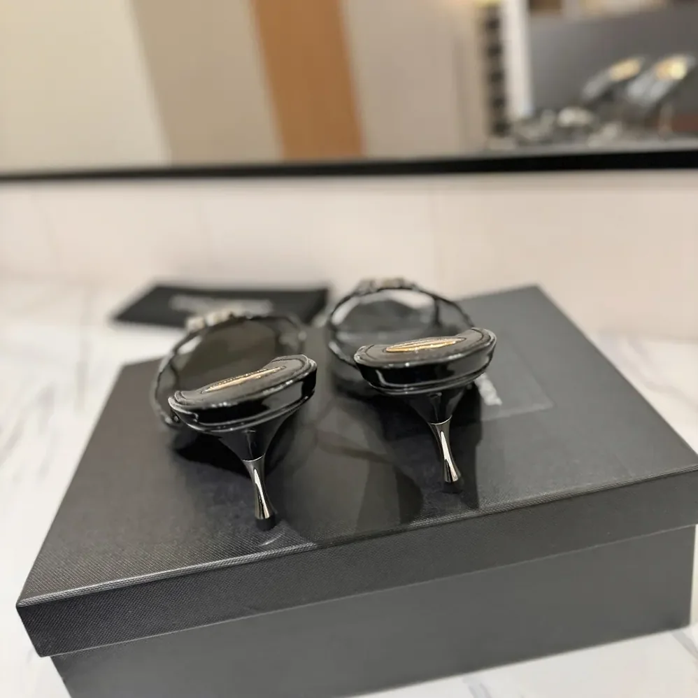 Saint Laurent YSL Jerry Mules in Tpu and Rhinestones for Women in Black Saint Laurent YSL Jerry Mules in Tpu and Rhinestones for Women in Black