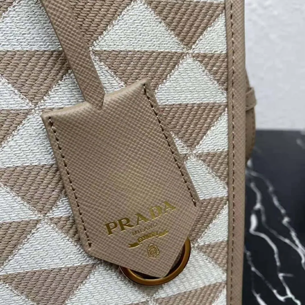 Prada Small Prada Symbole Embroidered Fabric Handbag for Women in Beige