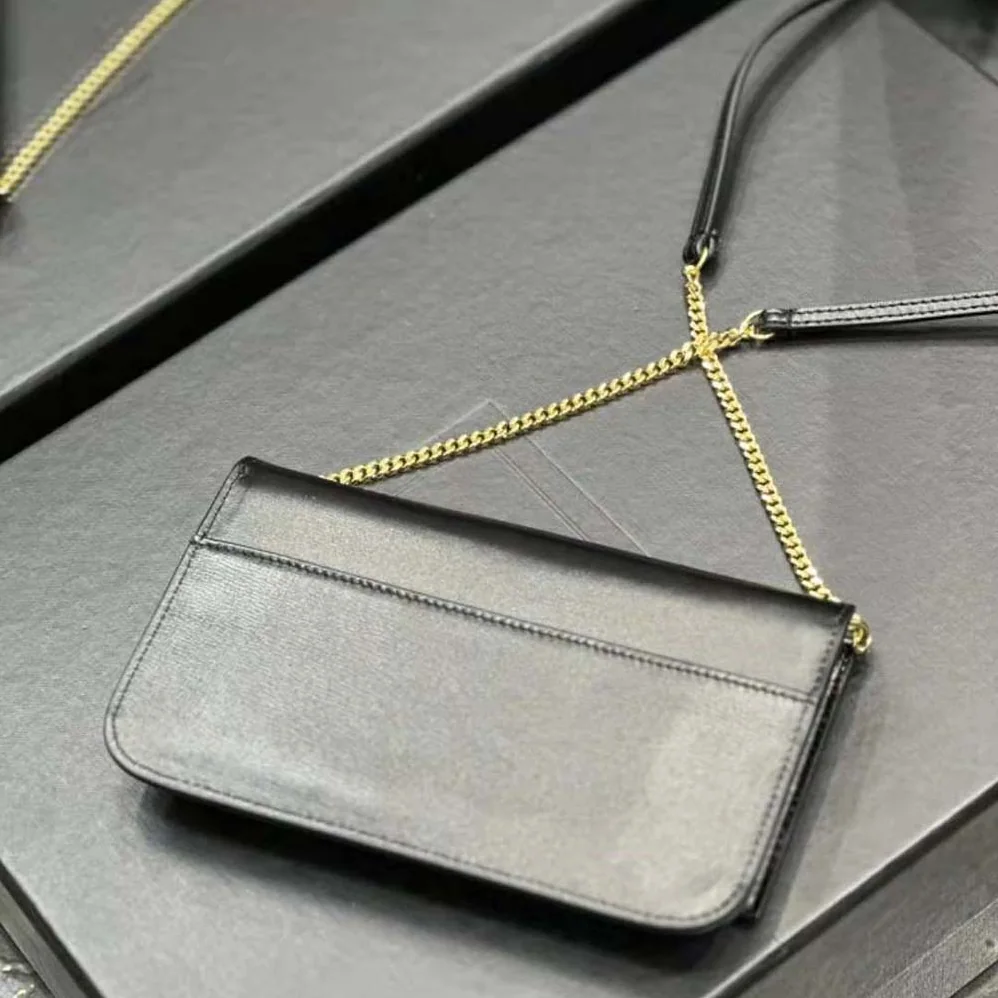 Saint Laurent YSL Cassandre Phone Holder with Strap in Smooth Leather for Women in Black Saint Laurent YSL Cassandre Phone Holder with Strap in Smooth Leather for Women in Black