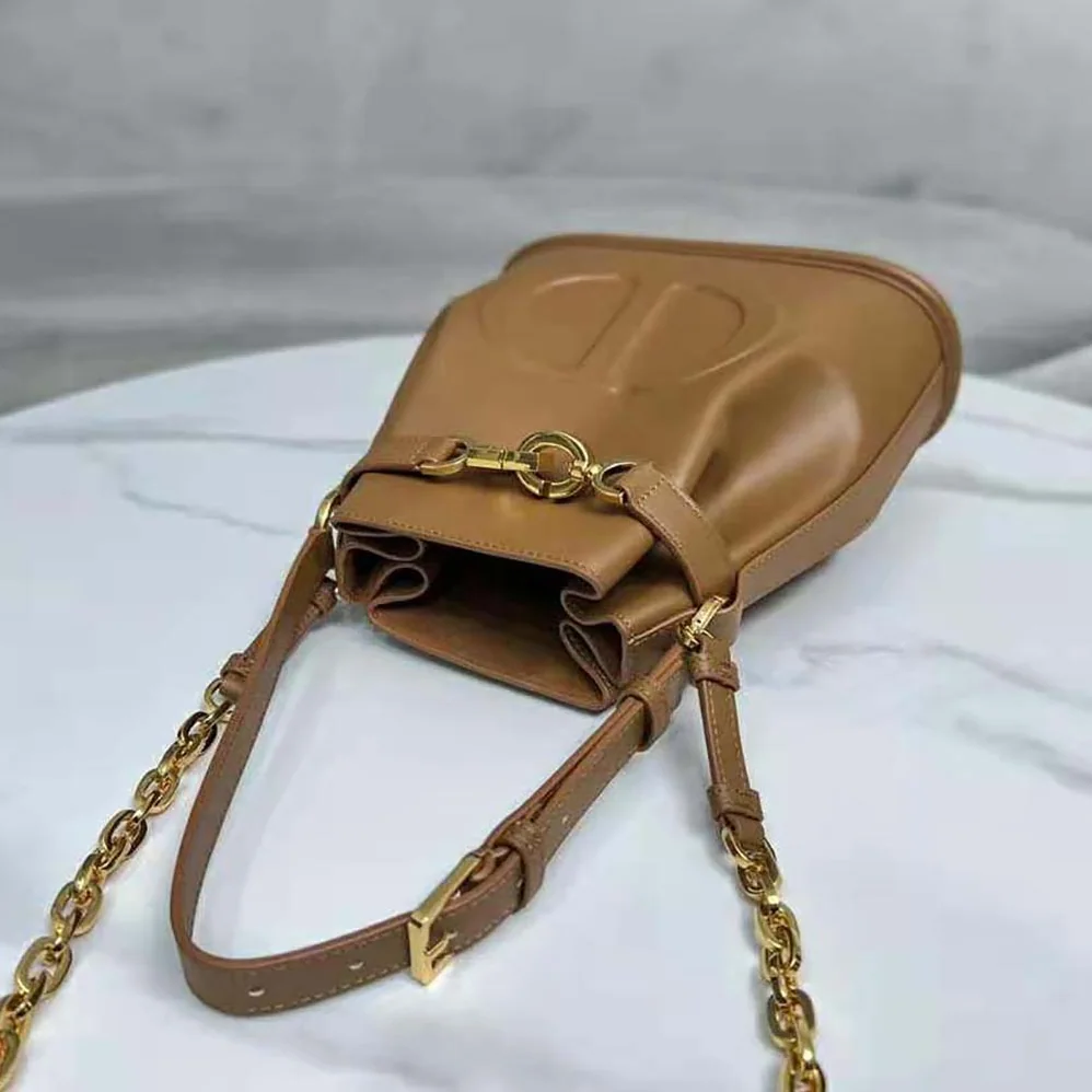 Dior Medium C'est Dior Bag Golden Saddle CD for Women in Embossed Calfskin Dior Medium C'est Dior Bag Golden Saddle CD for Women in Embossed Calfskin