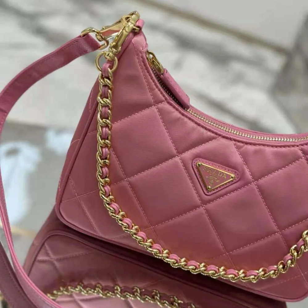 Prada Re-Edition 1995 Chaîne Re-Nylon Mini-bag for Women in Pink