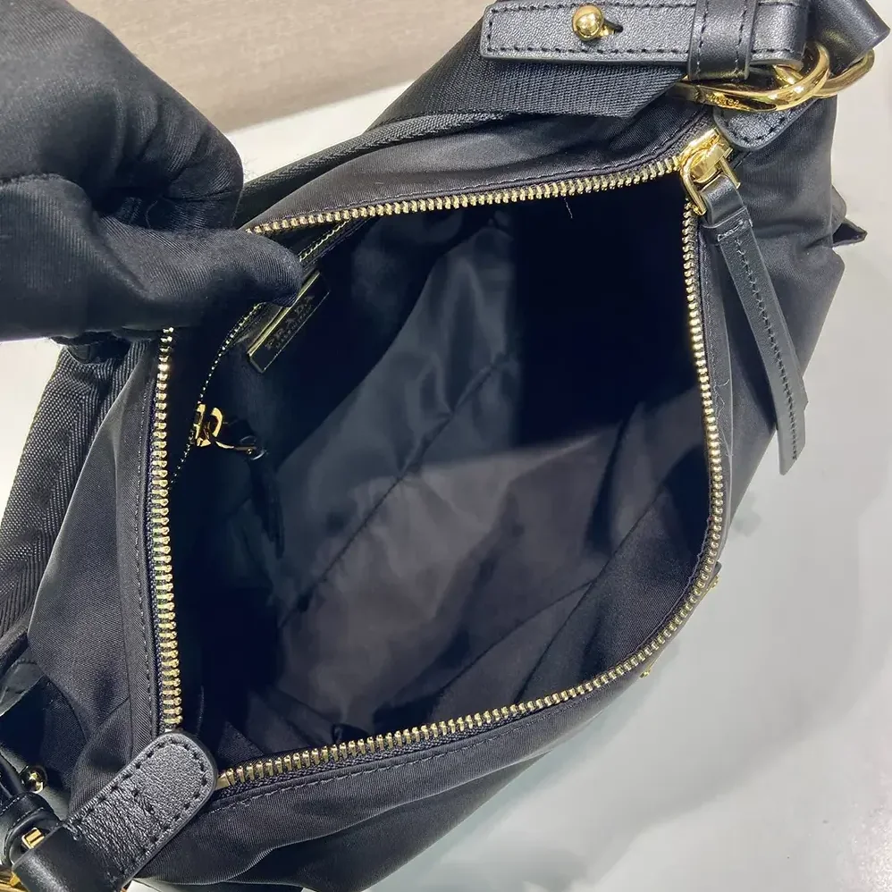 Prada Explore Large Re-Nylon And Leather Bag for Women in Black Prada Explore Large Re-Nylon And Leather Bag for Women in Black