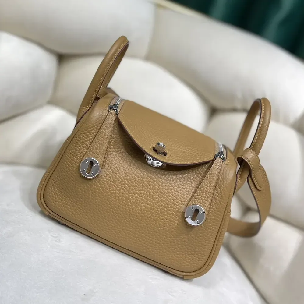 Hermes Lindy Mini 19 in Clemence Leather for Women in Sandy/Silver Hermes Lindy Mini 19 in Clemence Leather for Women in Sandy/Silver
