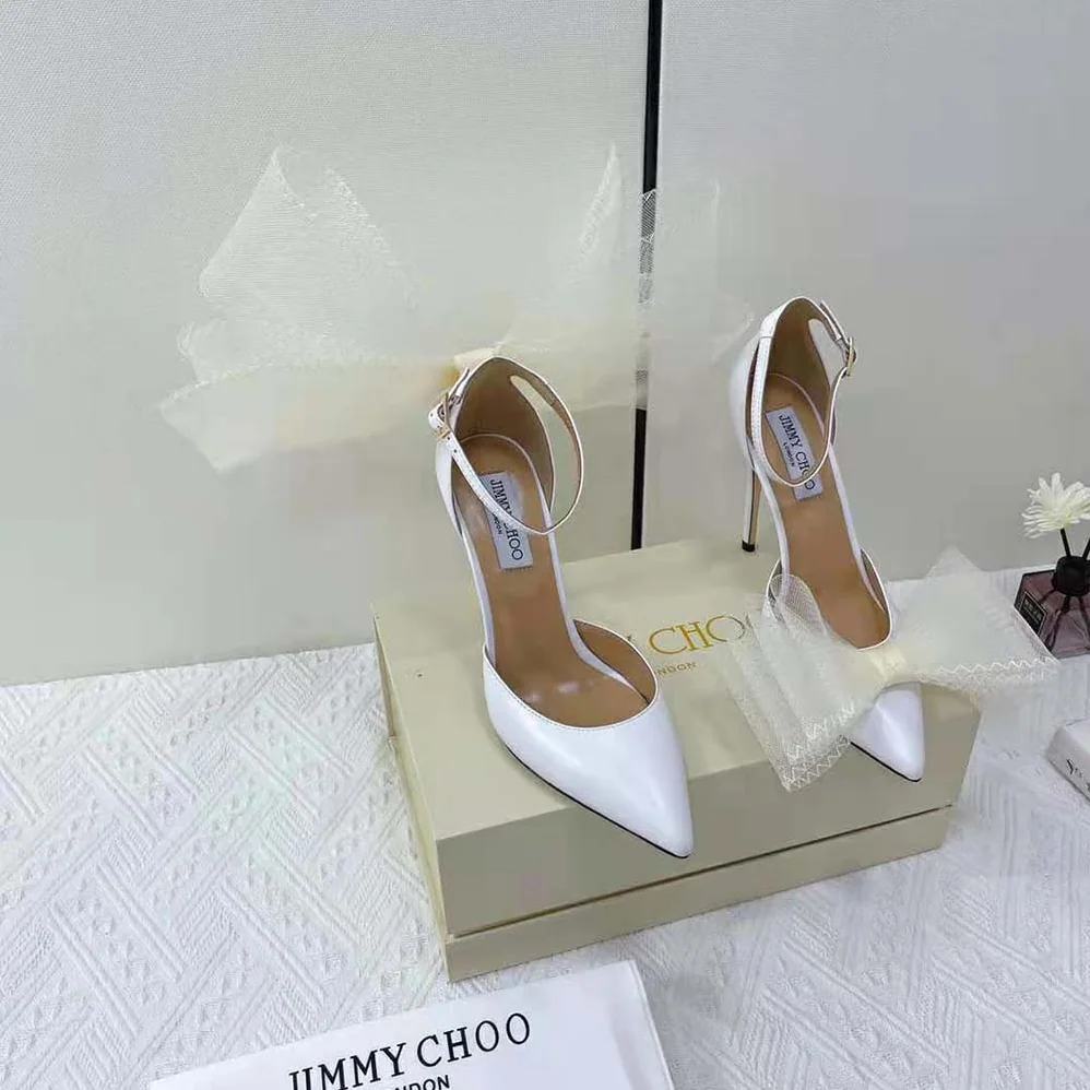 Jimmy Choo Averly 100 Latte Pumps with Asymmetric Grosgrain Mesh Fascinator Bows for Women Jimmy Choo Averly 100 Latte Pumps with Asymmetric Grosgrain Mesh Fascinator Bows for Women