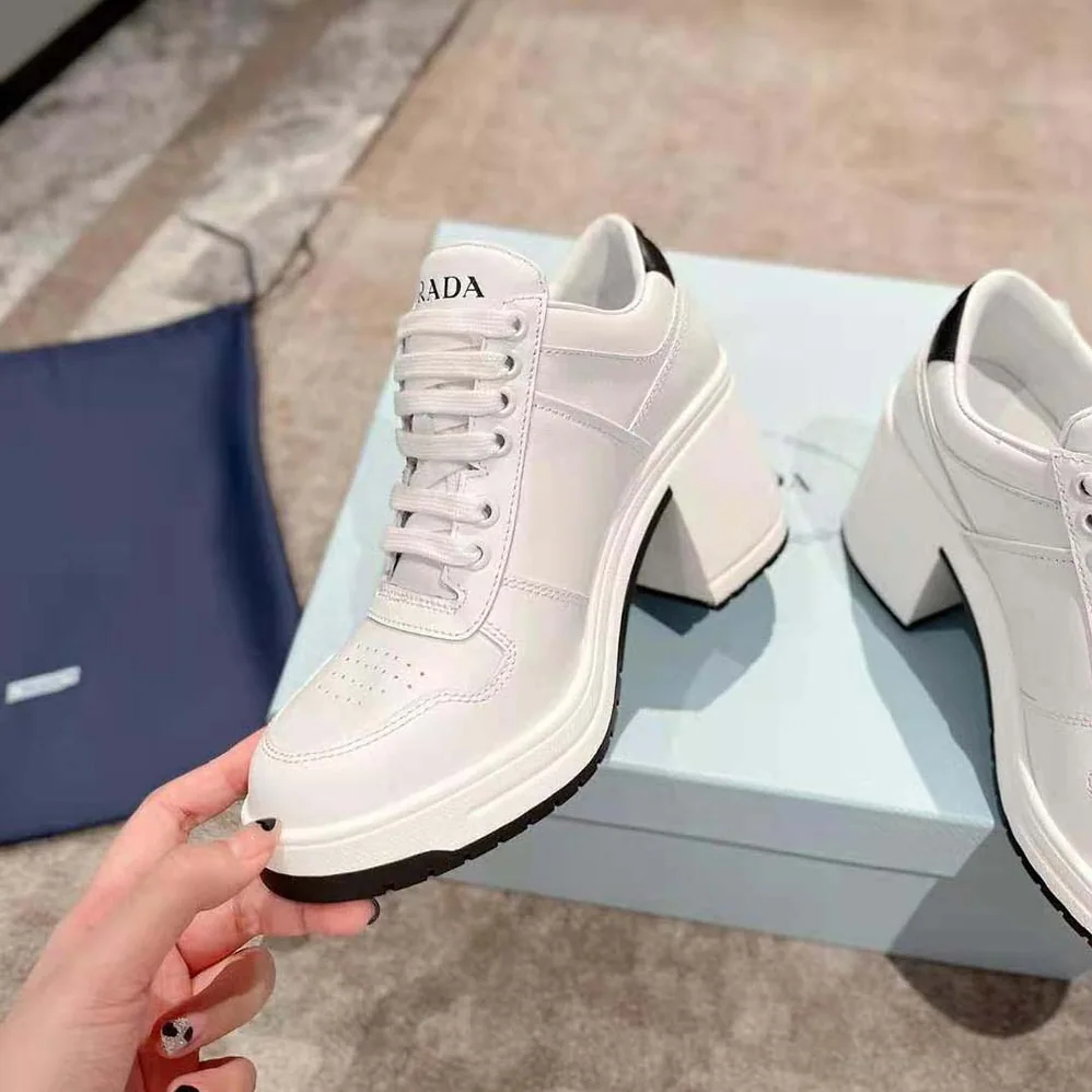 Prada Downtown High-Heeled Leather Sneakers for Women in White Prada Downtown High-Heeled Leather Sneakers for Women in White