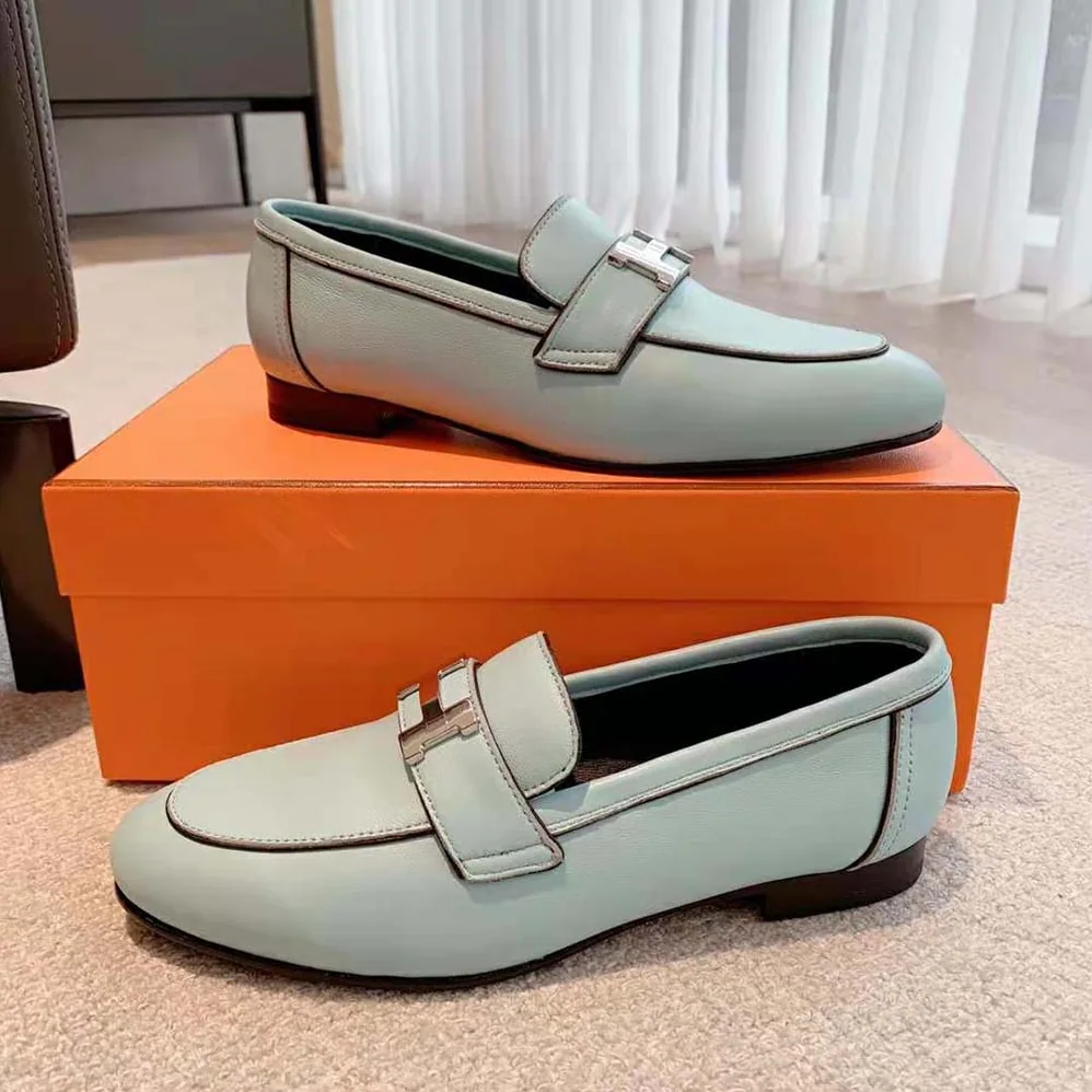 Hermes Paris Loafer in Calfskin with Palladium Plated Signature “H” Detail for Women in Blue Hermes Paris Loafer in Calfskin with Palladium Plated Signature “H” Detail for Women in Blue