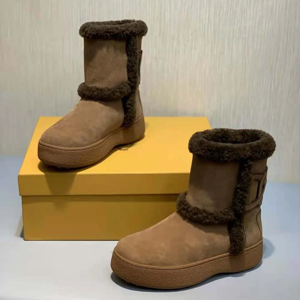TODS Tod's W. G. Ankle Boots in Suede for Unisex in Brown
