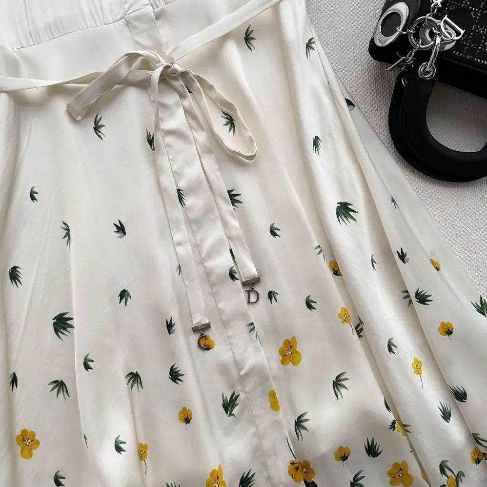 Dior Mid-Length Flared Shirtdress White Cotton Poplin with Yellow and Green Dior Buttercup Motif for Women Dior Mid-Length Flared Shirtdress White Cotton Poplin with Yellow and Green Dior Buttercup Motif for Women