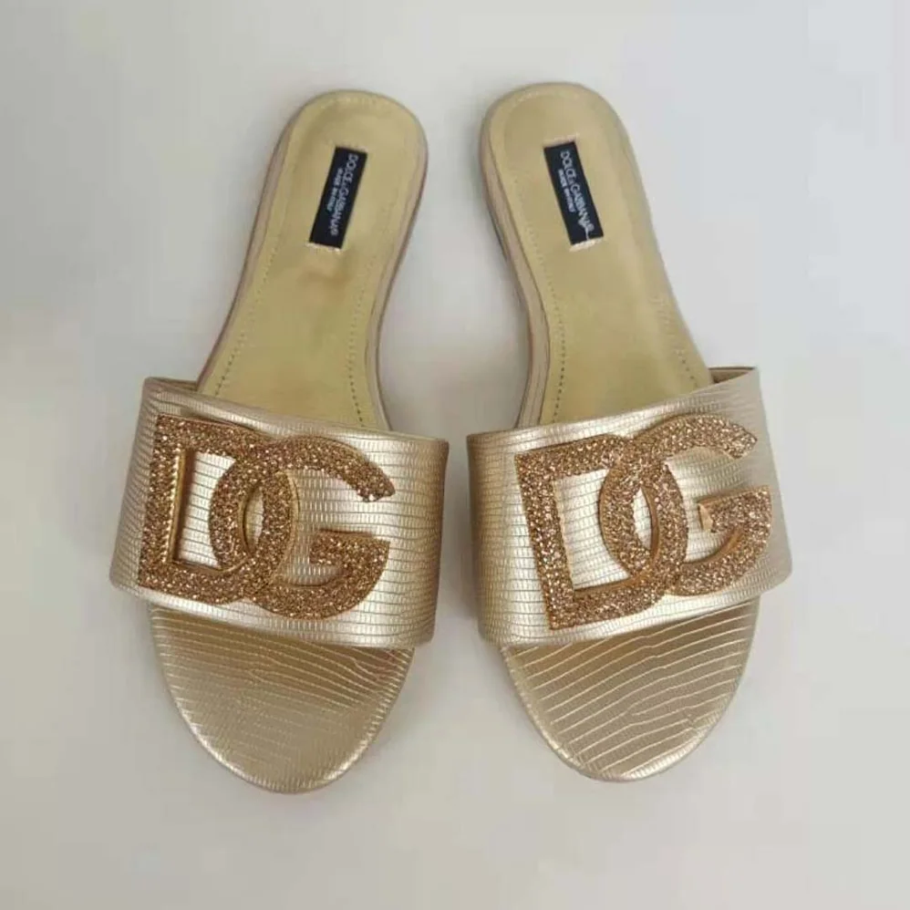 Dolce Gabbana D&G Foiled Iguana-Print Calfskin Slides with Rhinestone for Women in Detailed DG Logo Dolce Gabbana D&G Foiled Iguana-Print Calfskin Slides with Rhinestone for Women in Detailed DG Logo